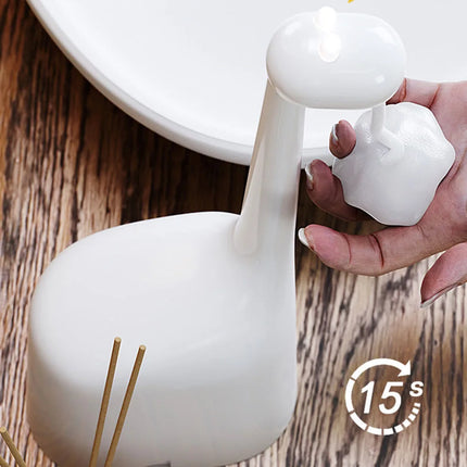 Automatische zeepdispenser in giraf design